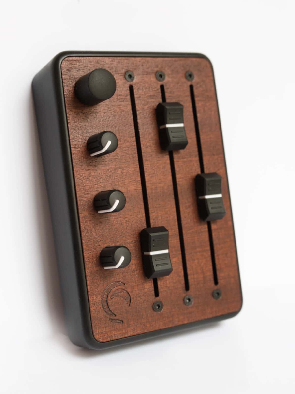 Brise MkII MIDI Controller standing upright, top view of the three 100mm faders, three knobs and the rotary encoder