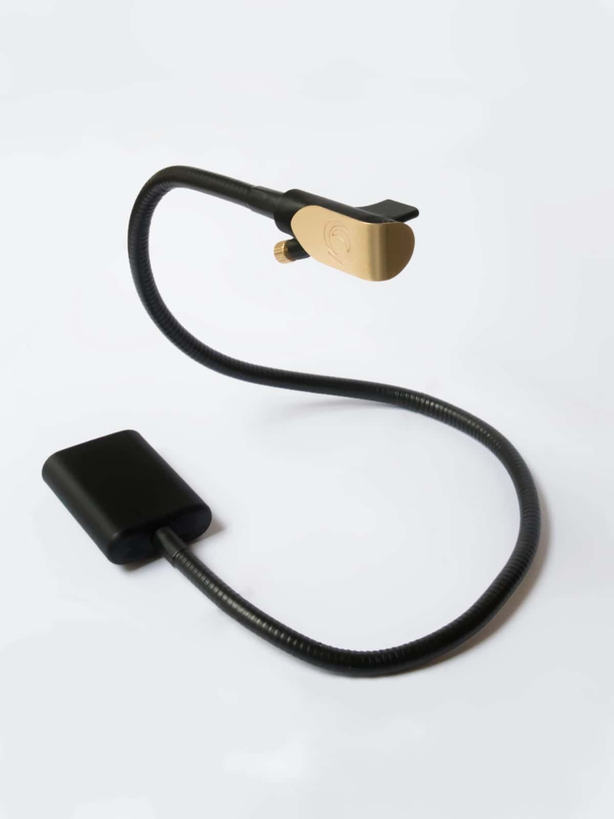 Zephyr breath MIDI controller, with its 60 cm gooseneck curved between the base and the brass mouthpiece