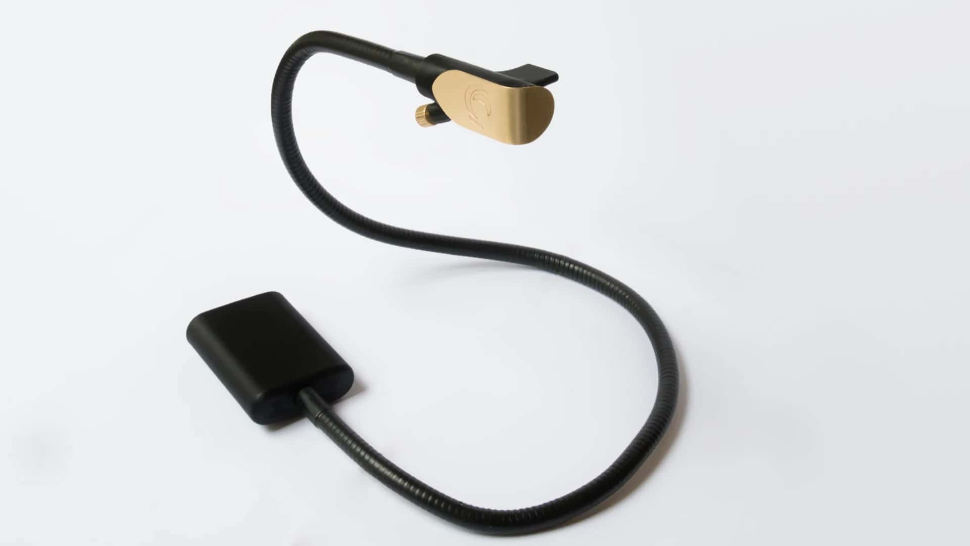 Zephyr breath MIDI controller, with its 60 cm gooseneck curved between the base and the brass mouthpiece