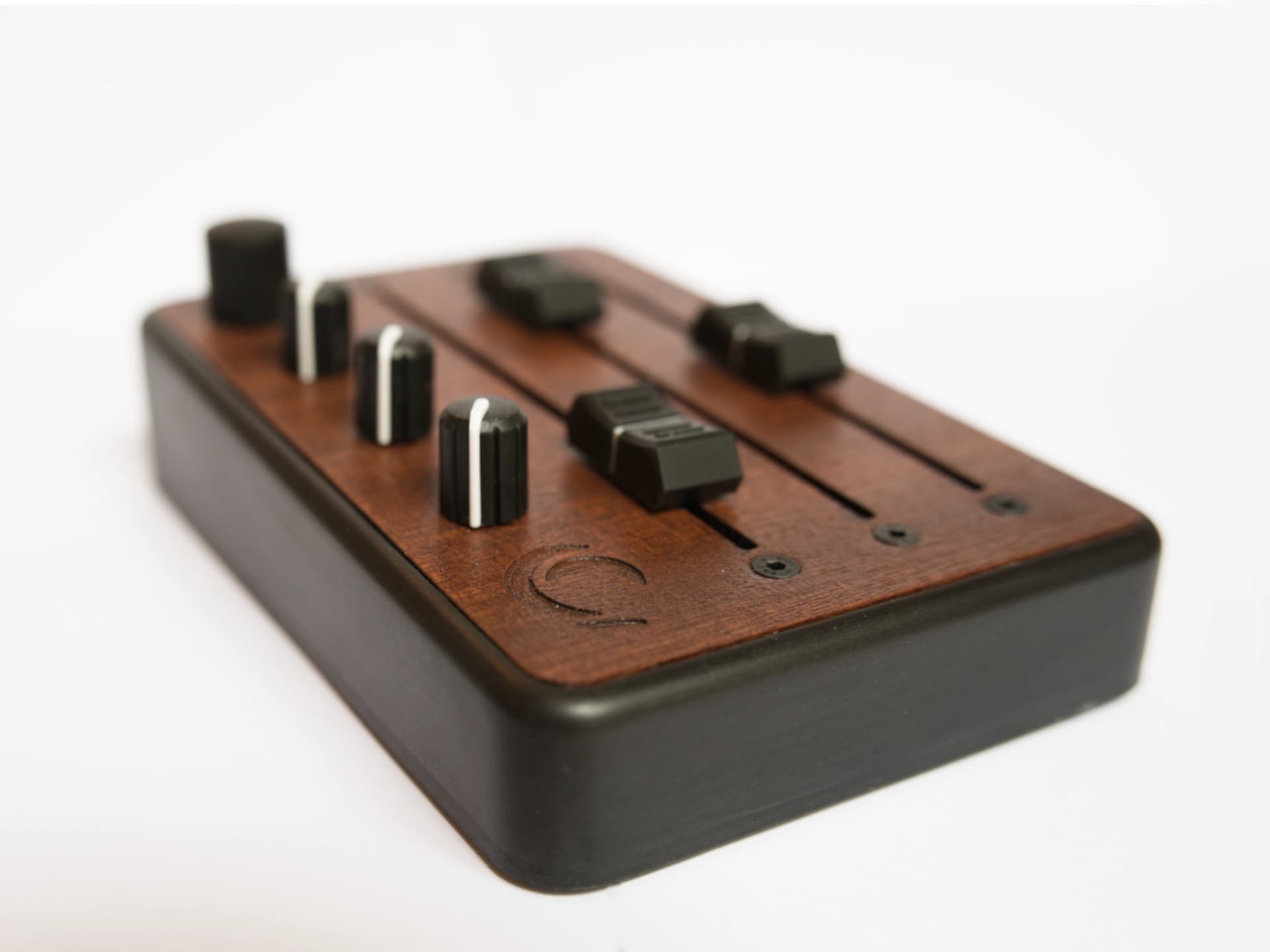 Brise MkII MIDI Controller in three-quarter view, showing its three long faders, knobs and clickable rotary encoder