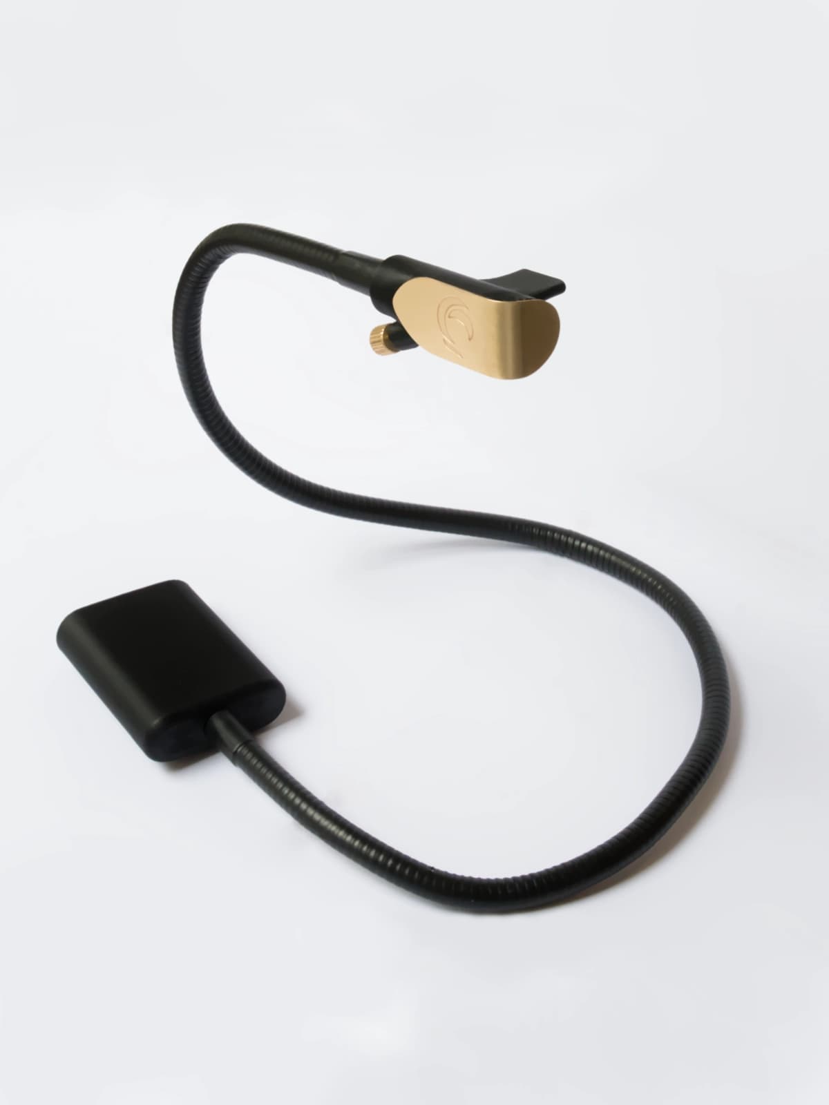 Zephyr breath MIDI controller, with its 60 cm gooseneck curved between the base and the brass mouthpiece