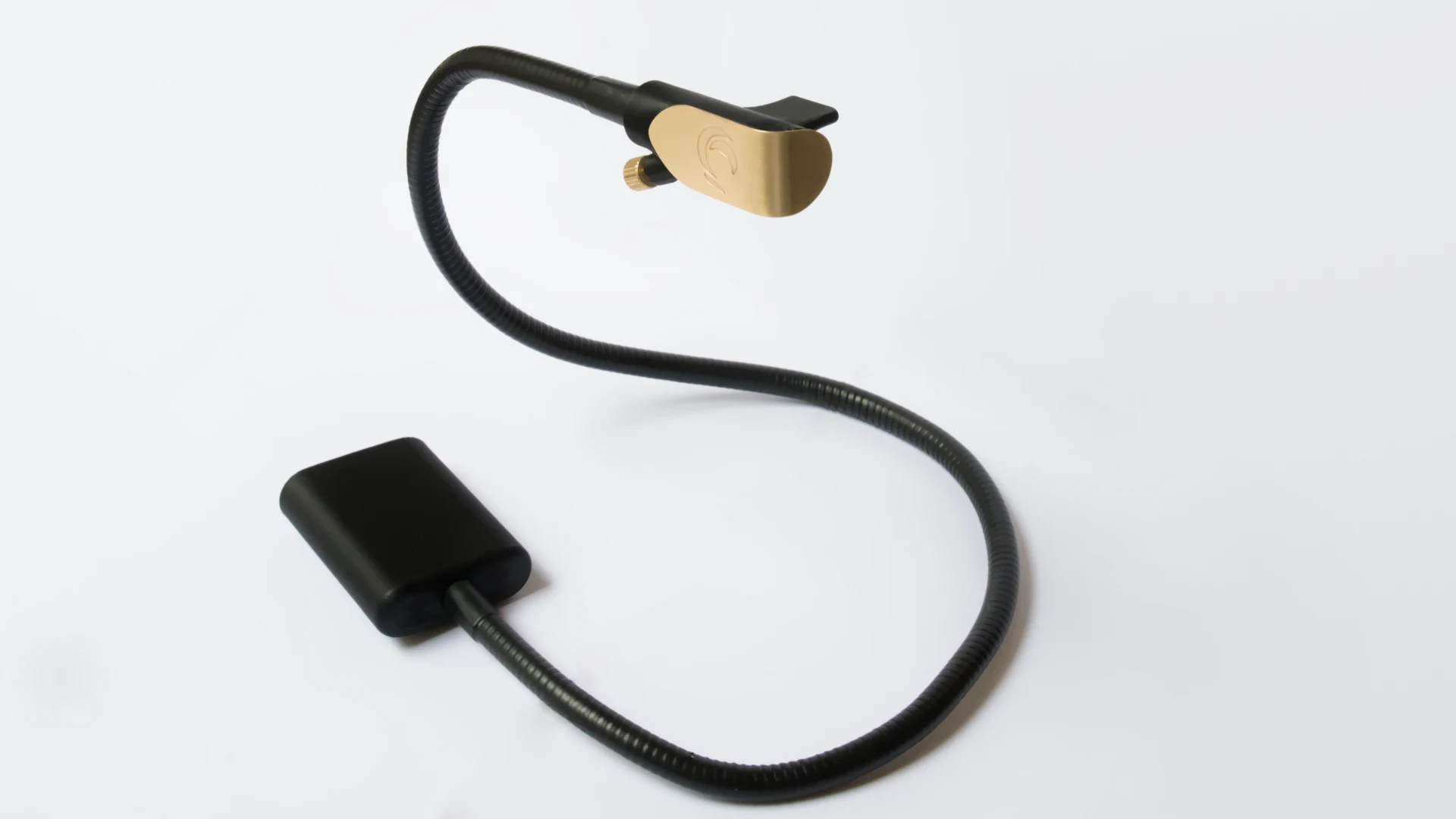 Zephyr breath MIDI controller, with its 60 cm gooseneck curved between the base and the brass mouthpiece