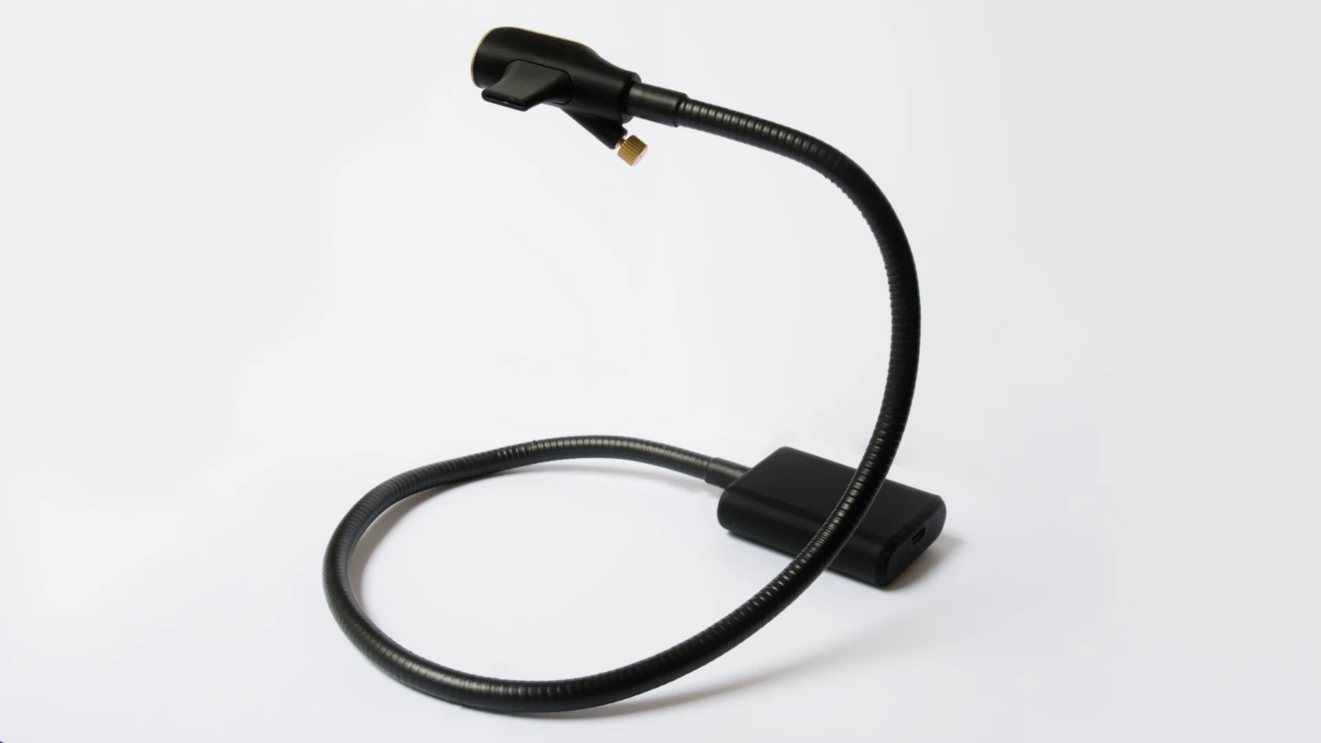 Zephyr breath MIDI controller seen from behind, the gooseneck rising from its base to the mouthpiece